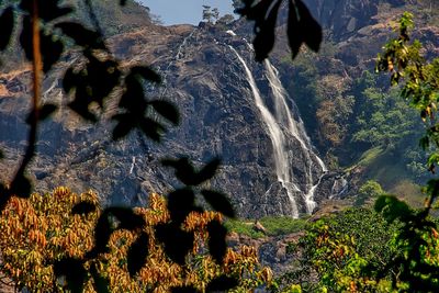 Scenic view of dudhsagar falls during sunny day