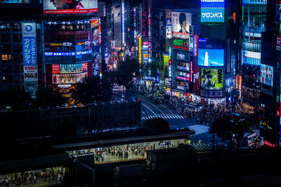 Illuminated buildings in city at night