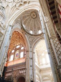 Low angle view of ornate ceiling of historic building