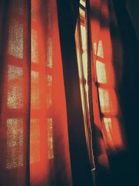 Close-up of orange window in building