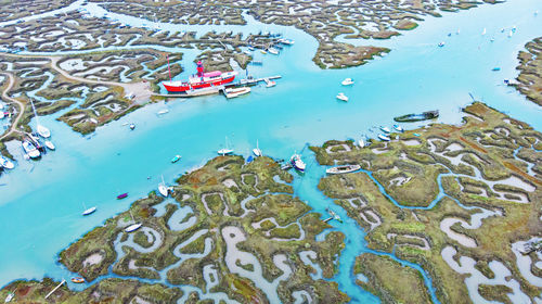 High angle view of wet shore at beach