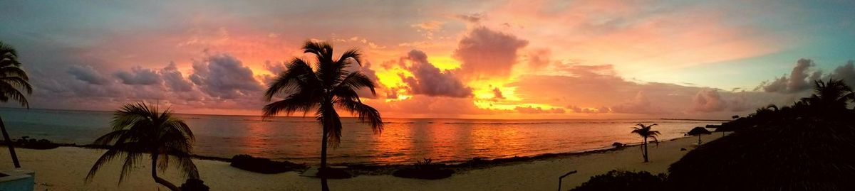 Scenic view of sunset over river