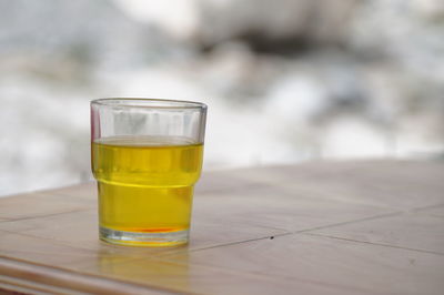 Close-up of beer in glass on table