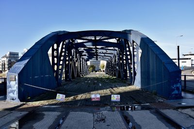 View of bridge against clear blue sky