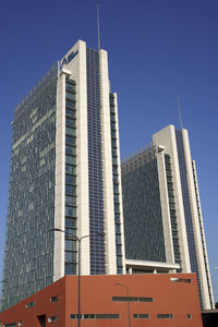 Low angle view of modern building against clear sky