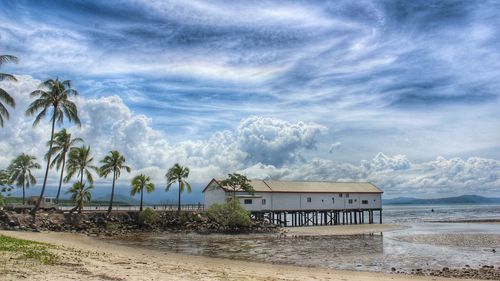 Scenic view of sea against cloudy sky