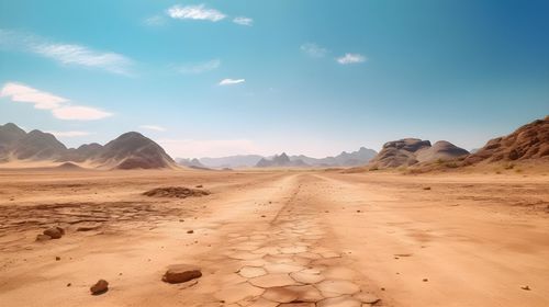 Scenic view of desert against sky