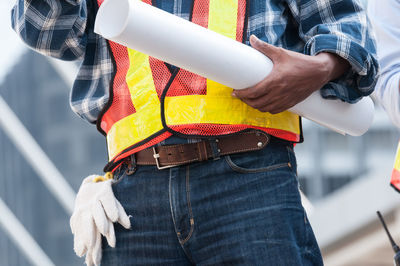 Midsection of man working