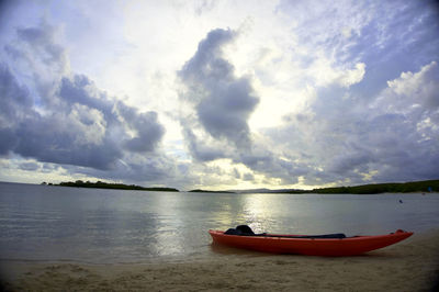 Scenic view of sea against cloudy sky