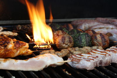 Close-up of meat on barbecue grill