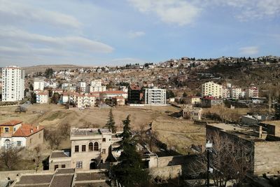 High angle shot of townscape against sky