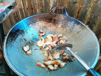 High angle view of meat in container on table