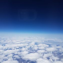 Aerial view of clouds against sky during winter