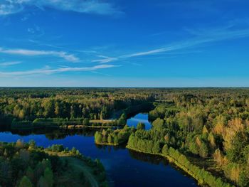 Scenic view of lake against blue sky