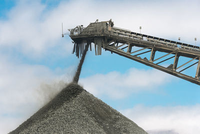 Stockpile and conveyor belt at an open-pit copper mine in copiapo, chile