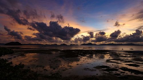 Scenic view of sea against sky at sunset