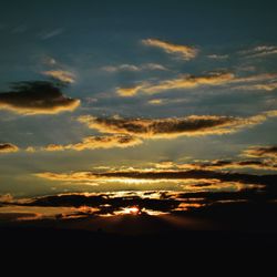 Scenic view of dramatic sky during sunset