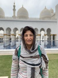 Portrait of woman visiting sheikh zayed mosque in abu dhabi