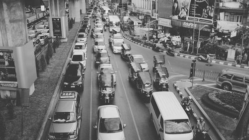 Cars on road in city