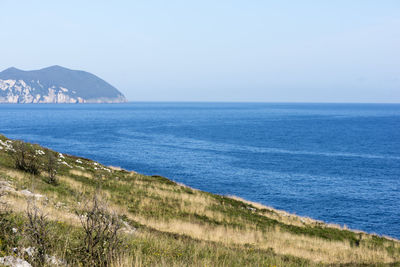 Scenic view of sea against clear sky