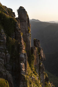 Stone wall with mountain range in background