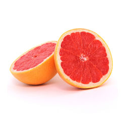 Close-up of orange slice against white background