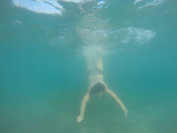 Man swimming in sea