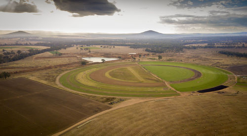 Aerial view of agricultural field against sky