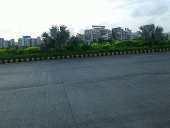 Buildings in distance with waterfront