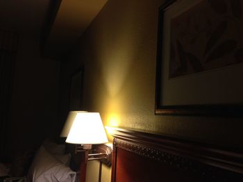 Low angle view of illuminated lamp