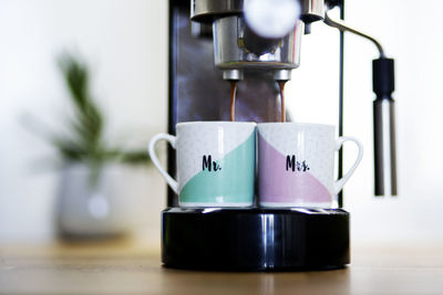 Close-up of coffee cup on table