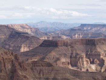 High angle view of rocky mountains against sky