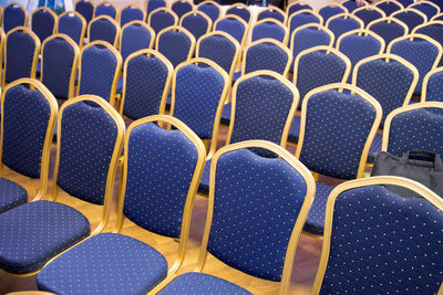 Full frame shot of empty chairs in stadium