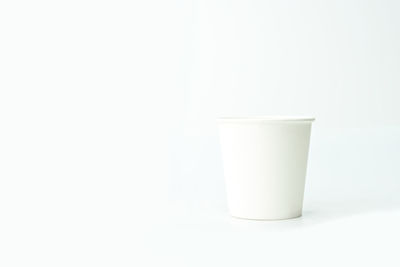 Close-up of tea cup against white background