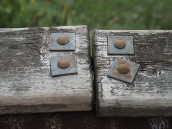 Close-up of old wooden plank on table