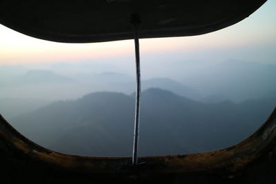 Scenic view of mountains against sky during sunset