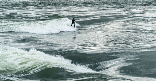 Man surfing in sea