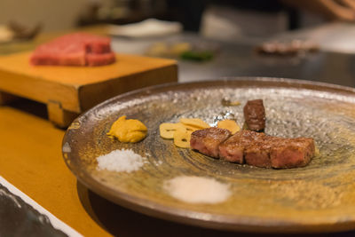 Close-up of food in plate on table