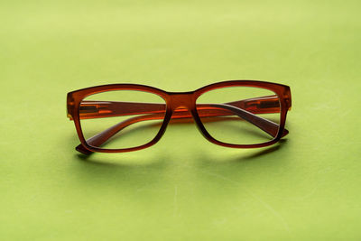 Close-up of sunglasses on table