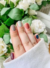 Close-up of woman hand holding flower bouquet