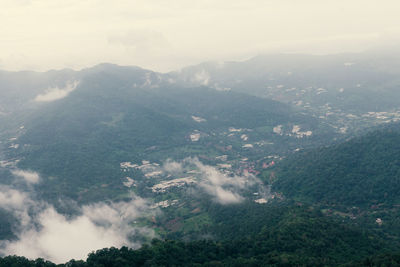 Aerial view of mountains against sky