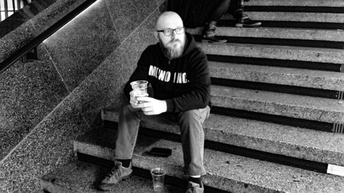 Man sitting on staircase