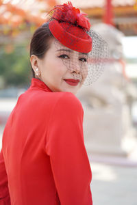 Portrait of woman in red hat