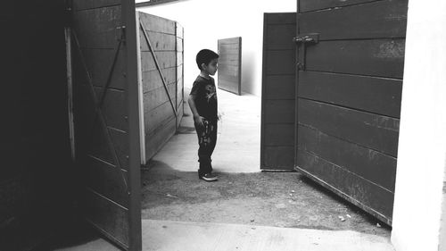 Full length of woman standing in building