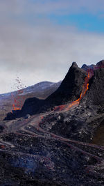 Smoke emitting from volcanic mountain at night