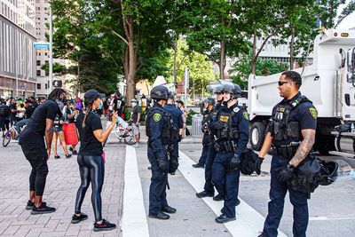 People standing on street in city