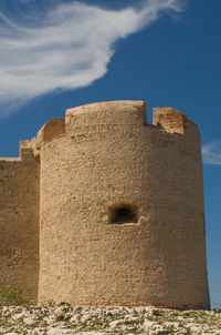Low angle view of historic building against sky