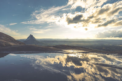 Scenic view of mountain against sky during sunset