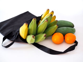 High angle view of fruits on white background