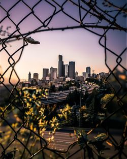 Cityscape against sky during sunset